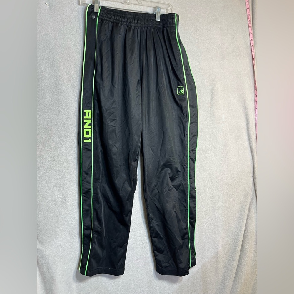 AND1 Medium Black Pants with Snaps Along Both Sides. Neon Green Trim